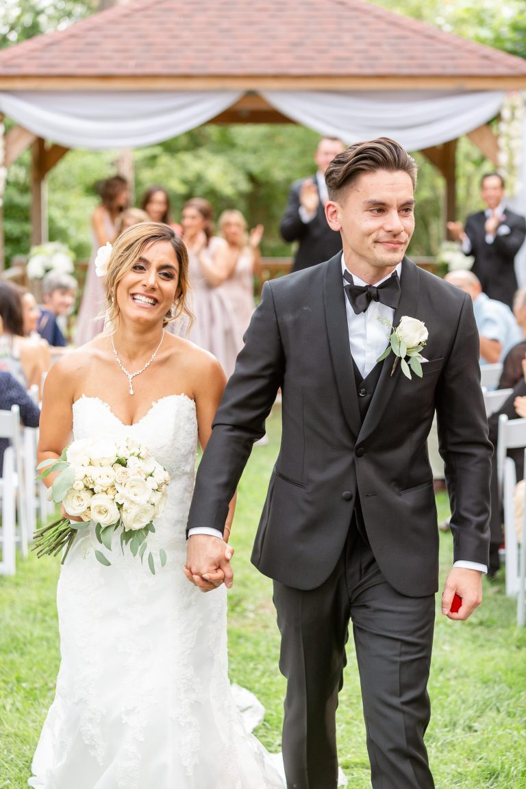 Pourie Nick Elsie Perrin Williams Estate Wedding Walking Down Aisle 768x1152